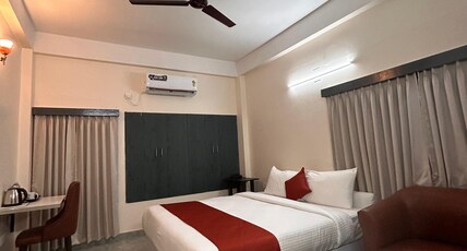 NK GUEST HOUSE Room Type - Deluxe Room