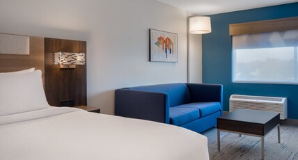 Holiday Inn Express & Suites OSCODA Room Type - 1 King Suite Lake View Single Sofa Bed Up to 4 Guests Holiday Inn Express & Suites OSCODA Room Type - 1 King Suite Lake View Single Sofa Bed Up to 4 Guests