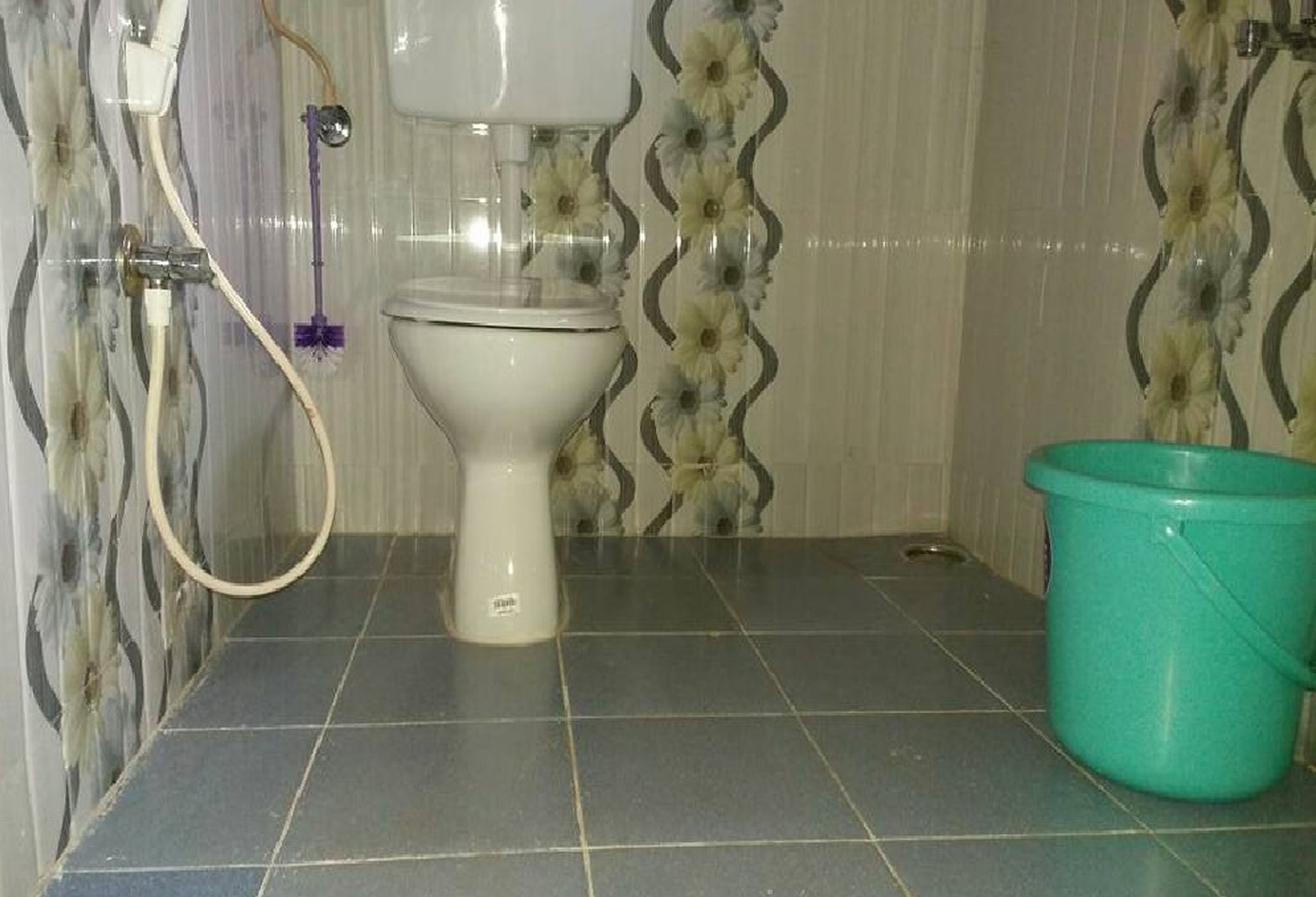 Sakthi Homestay | Rooms & Caretaker - Tap to explore photos