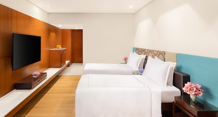 Taj Surajkund Resort & Spa, Delhi NCR Room Type - Deluxe Room Pool View Twin Bed Taj Surajkund Resort & Spa, Delhi NCR Room Type - Deluxe Room Pool View Twin Bed