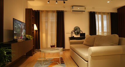 Luxora Stays | Beside Airport | Entire Apartments Room Type - A105|Airport view from terrace|50 inch TV|Coffee Maker