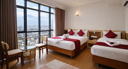 Drishya Hotel Room Type - Deluxe Triple Room with Mountain or City View - Free VIP 360 degree Restro lounge access & 10% off Drishya Hotel Room Type - Deluxe Triple Room with Mountain or City View - Free VIP 360 degree Restro lounge access & 10% off