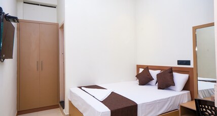 New AS Tourist Home Room Type - Deluxe Double room with AC