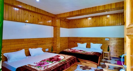 Jibhi wooden homestay Room Type - Family Room with mountain view