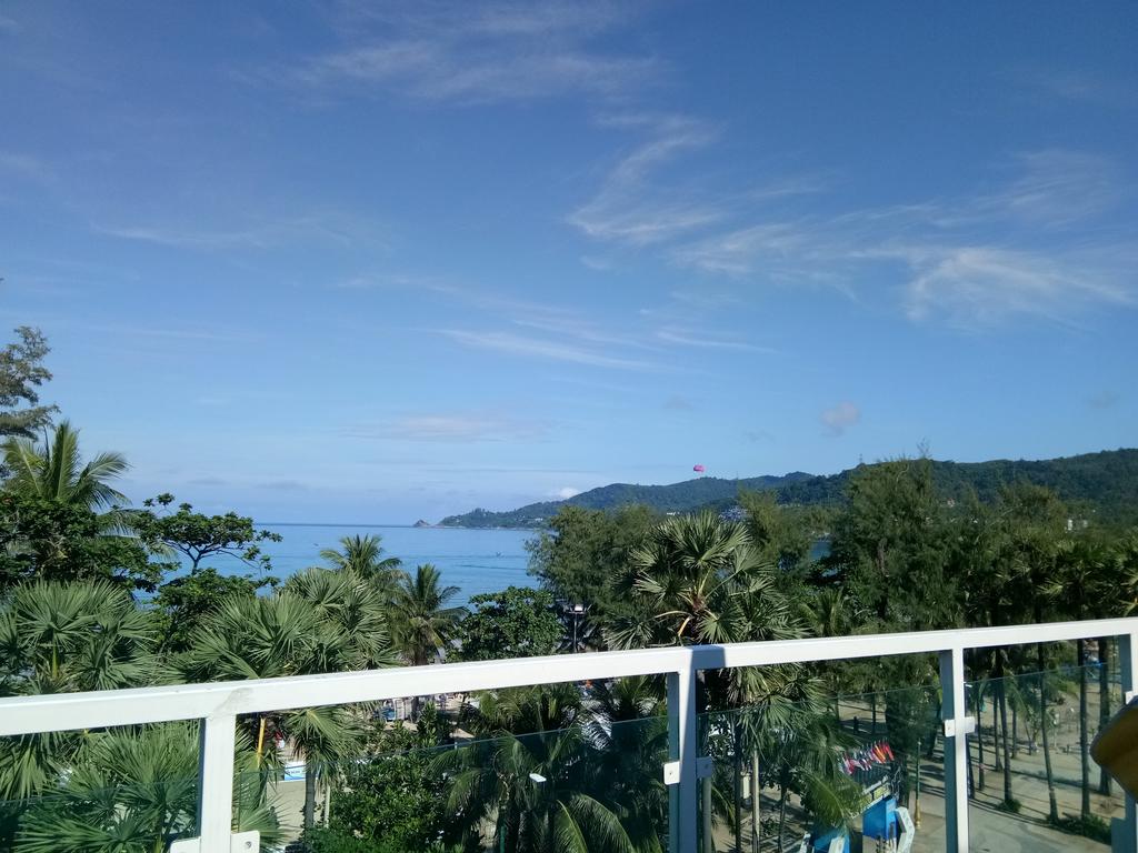 Island Patong Beachfront Hotel - Tap to explore photos