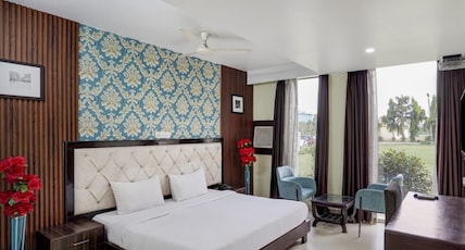 JPS Resort with Swimming Pool IMT Manesar Room Type - Super Deluxe Room with Access to Swimming Pool JPS Resort with Swimming Pool IMT Manesar Room Type - Super Deluxe Room with Access to Swimming Pool