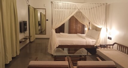 The Orchard Resort Room Type - Premium AC Cottage with Private Outdoor Sitout
