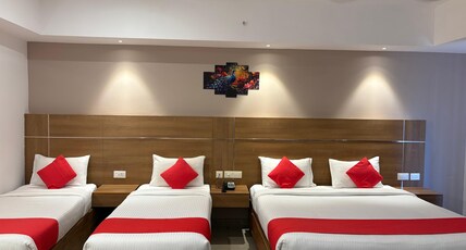 Mangala Temple View Room Type - FAMILY 4 BEDDED DELUXE AC ROOM