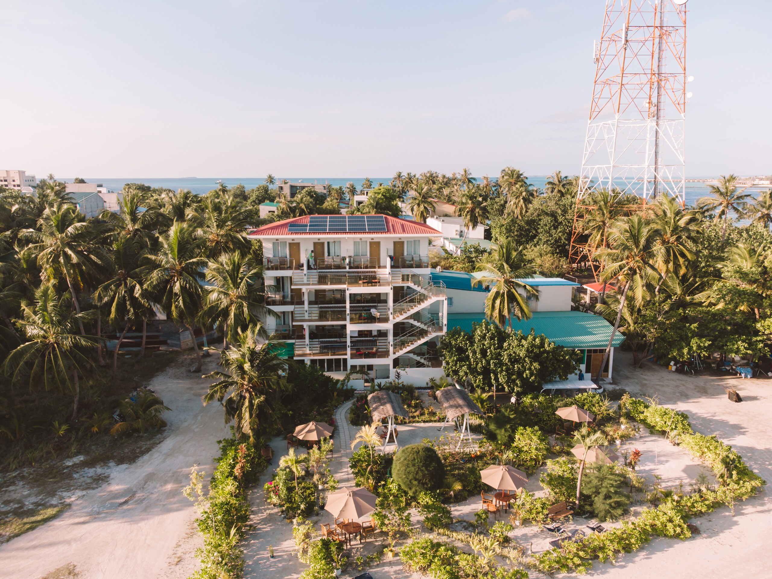 Reef Edge Thulusdhoo Guesthouse - Tap to explore photos