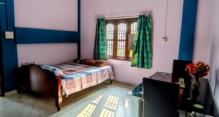 Makum Homestay Room Type - Family Room with attached bathroom
