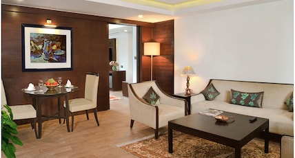 Golden Tulip Srinagar (formerly RK Sarovar Portico Srinagar) Room Type - Executive Suite - 1 Double Bed 46SQM Free WiFi Living Room Bathtub and Shower Golden Tulip Srinagar (formerly RK Sarovar Portico Srinagar) Room Type - Executive Suite - 1 Double Bed 46SQM Free WiFi Living Room Bathtub and Shower