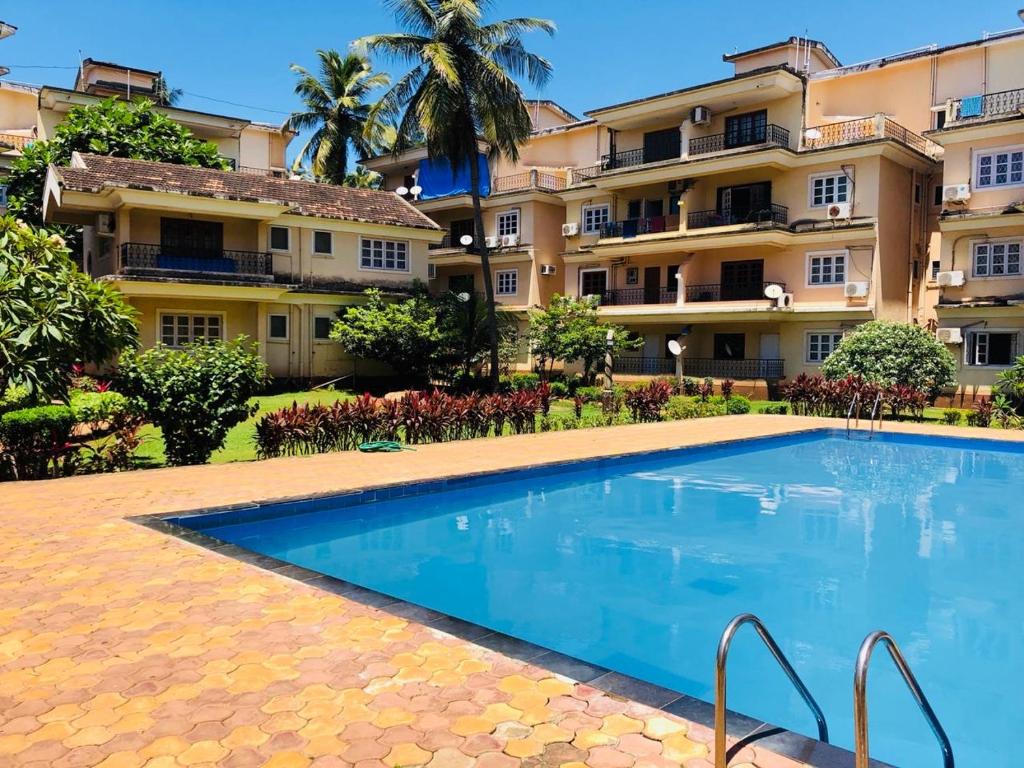Calangute Apartment with Pool - Tap to explore photos