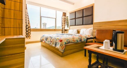 Hotel Gyan Room Type - Ganga Facing Double Bed Deluxe Room (River View) Single Members not allowed