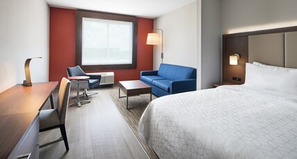 Holiday Inn Express & Suites Lubbock Central - Univ Area Room Type - 1 King Communications Mobility Accessible Sofa Bed Holiday Inn Express & Suites Lubbock Central - Univ Area Room Type - 1 King Communications Mobility Accessible Sofa Bed