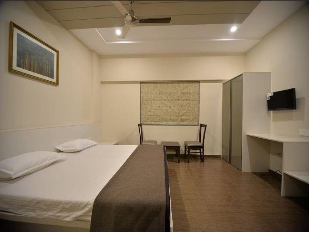 Hotel Naman - Tap to explore photos