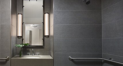 Kimpton CLARET HOTEL Room Type - 1 Bedroom Suite Mobility Accessible Roll in Shower