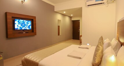 Kartik Inn Room Type - Deluxe room