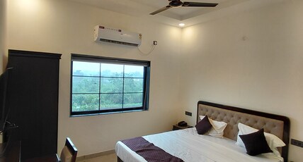 Hotel Narmada inn Room Type - Deluxe Room with Garden View Hotel Narmada inn Room Type - Deluxe Room with Garden View