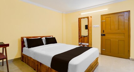 Hotel O KSRTC Pandalam Pathanamthitta Formerly Elite Tourist Homes Room Type - Classic