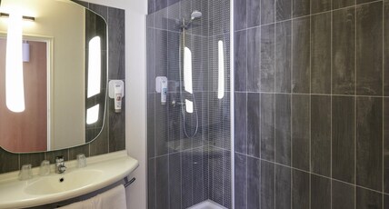 ibis Cholet Room Type - Standard Room with one double bed and one single bed ibis Cholet Room Type - Standard Room with one double bed and one single bed
