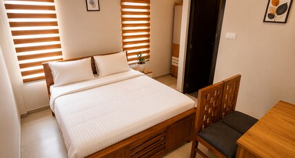 Blue Pearl Residency | Near Technopark Room Type - Deluxe Double Room AC