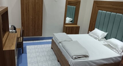 HOTEL TULSI PVT LTD Room Type - LUXURY ROOM