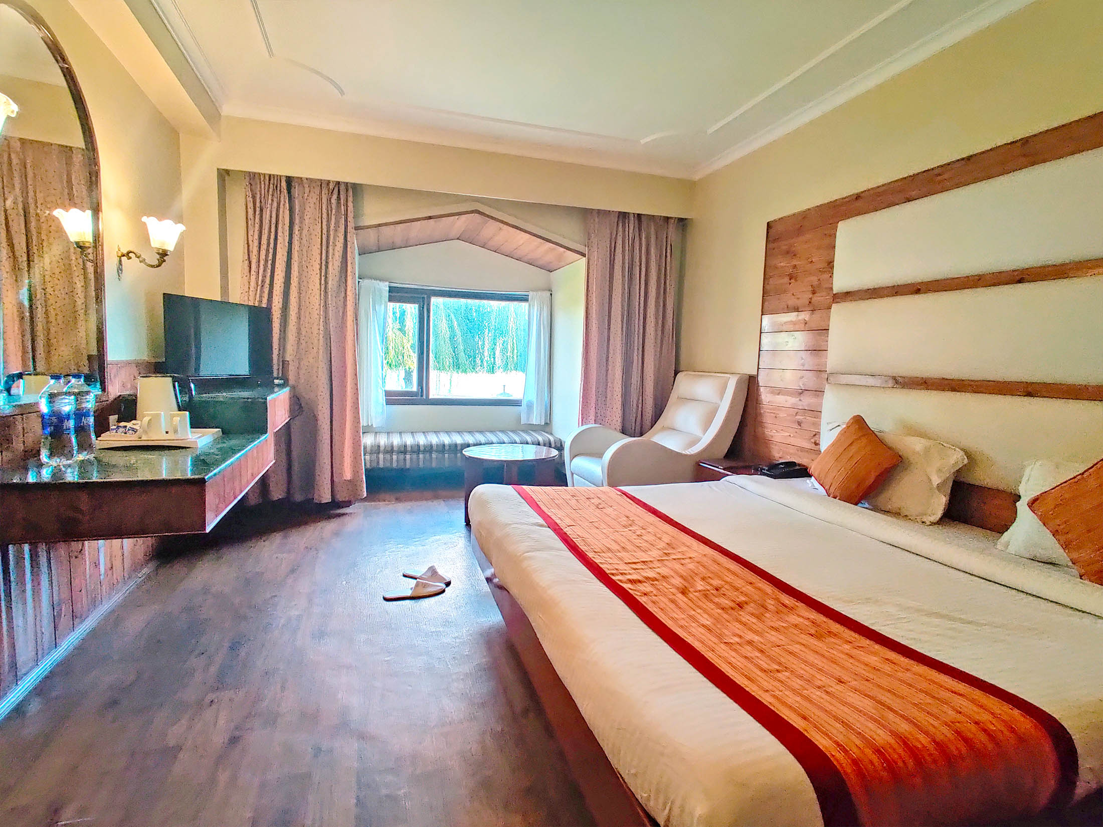 Royal Jardin Whistling Pines Resort - Tap to explore photos