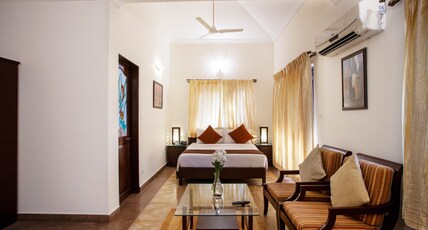Goa Villagio Resort & Spa - A Unit of IHM, Goa Room Type - Deluxe Room with Sitting Area