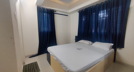 Ambadi Blueberry Hotel Room Type - Deluxe Room