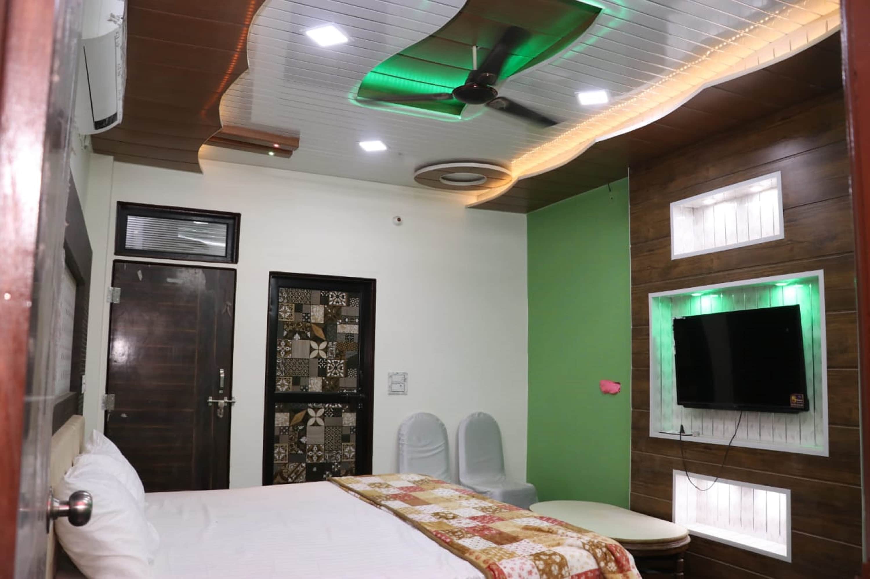 Hotel Rasraj - Tap to explore photos