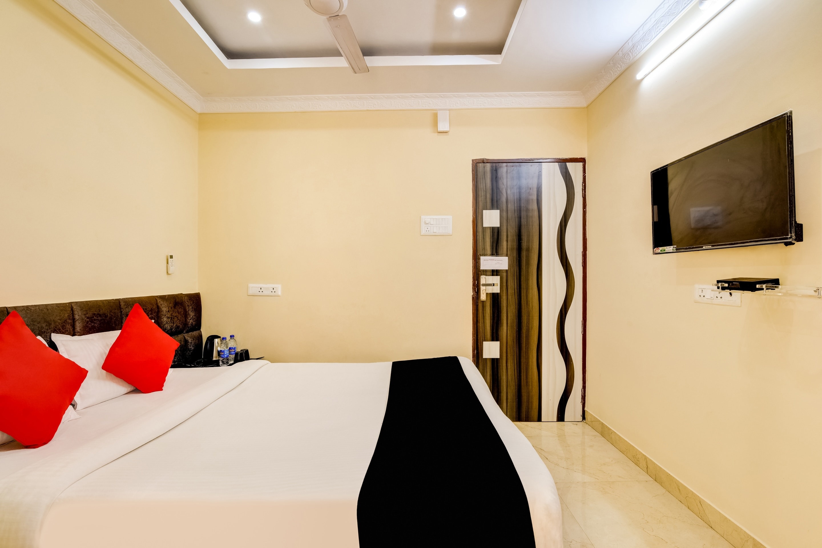 Capital O Good Luck Residency Hotel - Tap to explore photos