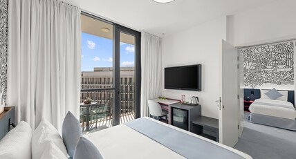 Nest Hotel Room Type - Select Family Room with Balcony Nest Hotel Room Type - Select Family Room with Balcony