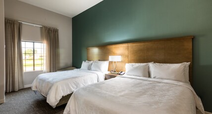 Staybridge Suites LAKE JACKSON, an IHG hotel Room Type - 2 Queen 1 Bedroom Suite Communication Accessible Staybridge Suites LAKE JACKSON, an IHG hotel Room Type - 2 Queen 1 Bedroom Suite Communication Accessible