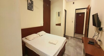 Hotel Om International Room Type - Deluxe Non AC Room Hotel Om International Room Type - Deluxe Non AC Room