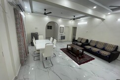 IP service apartment saligramam