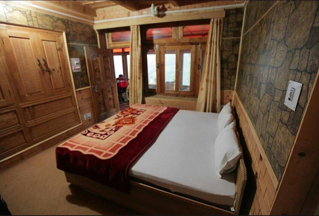 Satyam Homestay | Rooms & Kitchen - Tap to explore photos