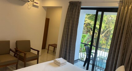 Henmil Hideaway Room Type - 1bhk with balcony and pool view