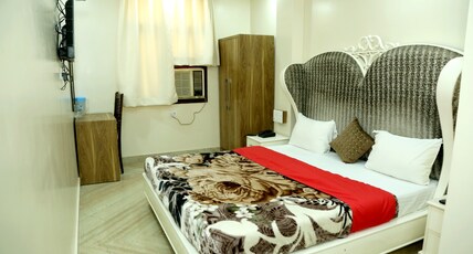 Hotel Poonam International Room Type - Deluxe Double Room  AC With Complimentary WiFi