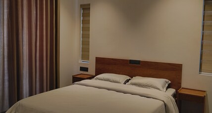 Olam Homestay Room Type - Premium Queen Room with Private Sit-Out