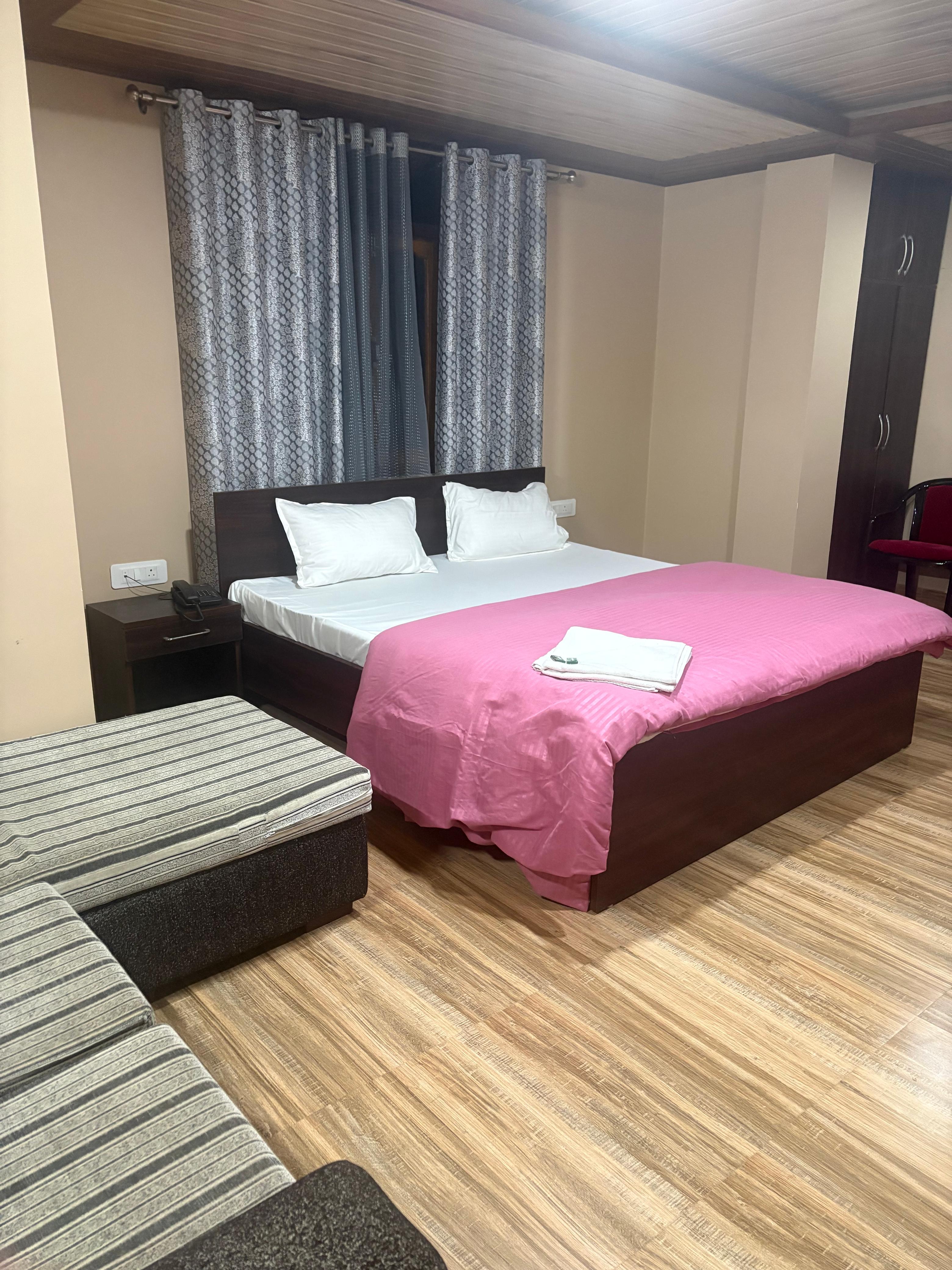 Hotel Diksha Homes - Tap to explore photos