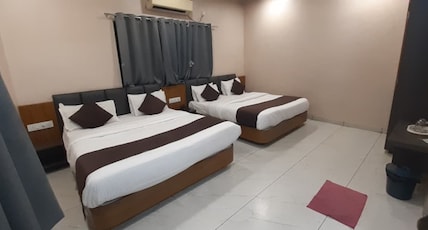 HOTEL PURUSHOTTAM Room Type - 4 Bedded AC Family Room (Price is for 4 Adults) HOTEL PURUSHOTTAM Room Type - 4 Bedded AC Family Room (Price is for 4 Adults)