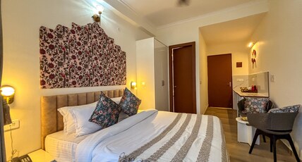 The Neeraj Ganga Rajmahal Wellness With Ganga View Room Type - Deluxe Room With Partial Mountain View The Neeraj Ganga Rajmahal Wellness With Ganga View Room Type - Deluxe Room With Partial Mountain View