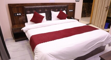 Hotel M Sarthak Room Type - Deluxe