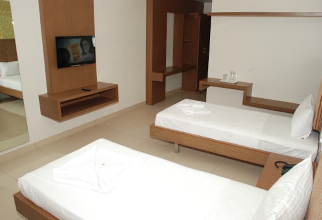 Hotel PLA Amrith Inn -Go2Hotels - Tap to explore photos