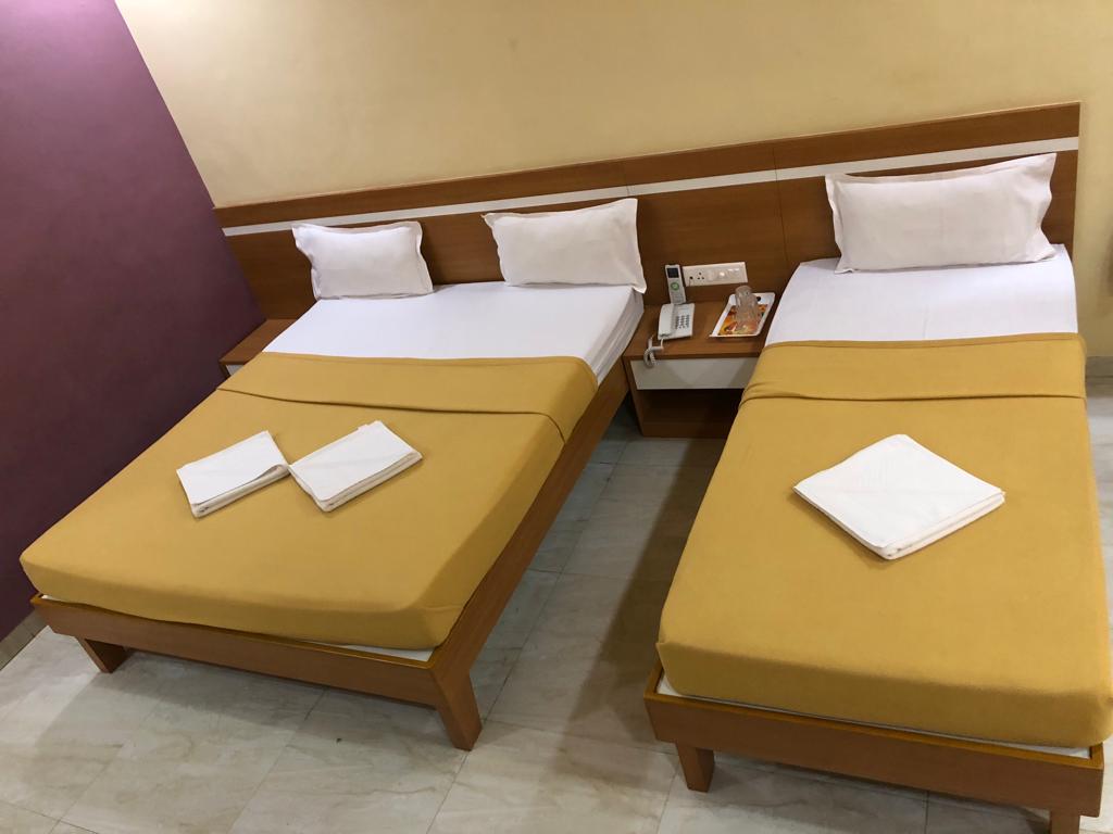 Hotel Tulsi Inn - Tap to explore photos