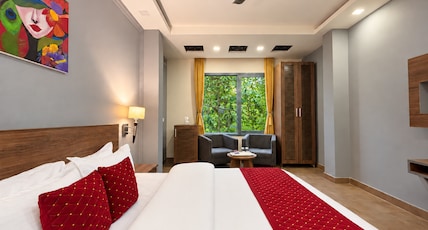 The Maple Woods Resort - (3 mins walk from Kosi River) Room Type - Deluxe Room The Maple Woods Resort - (3 mins walk from Kosi River) Room Type - Deluxe Room