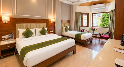 juSTa Riverside Resort Srinagar Room Type - Superior Triple Room - Garden Access juSTa Riverside Resort Srinagar Room Type - Superior Triple Room - Garden Access