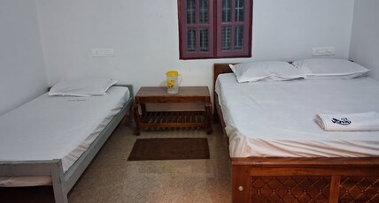 Kamalavel Mahal Room Type - Normal Bedroom AC