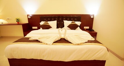 AGRAHARI SHOPPING CENTRE & MARRIGE HALL Room Type - AC Deluxe Room