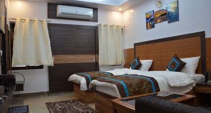 HOTEL THE GOLDEN SUNRISE Room Type - Super Deluxe Room